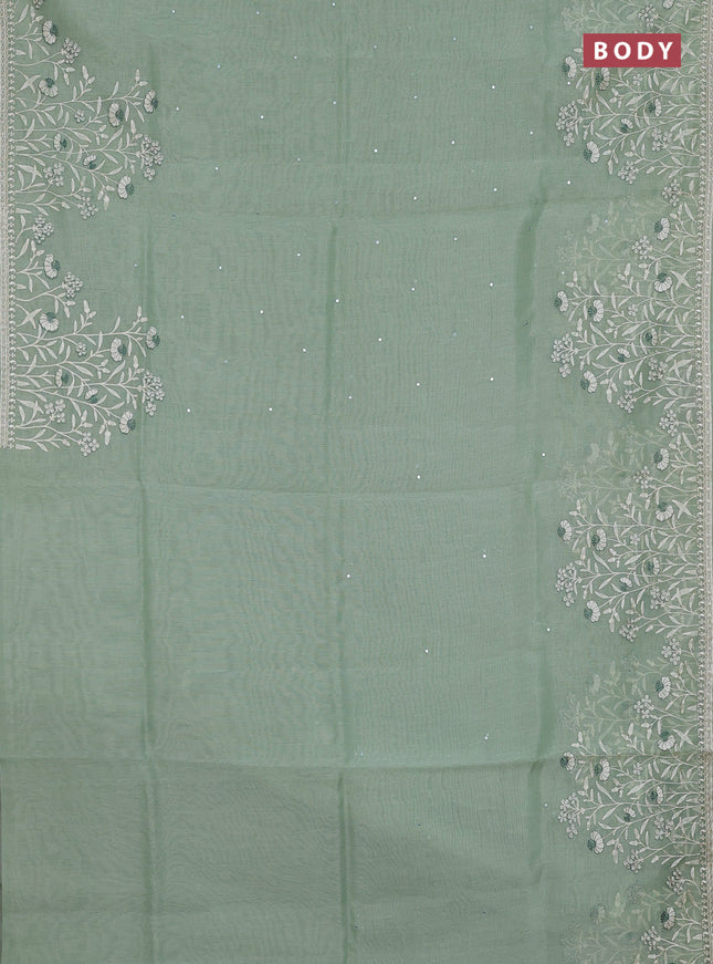 Semi Chanderi Saree pastel green with allover mirror embroidery buttas and corsha lace work border