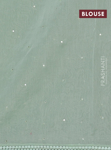 Semi Chanderi Saree pastel green with allover mirror embroidery buttas and corsha lace work border