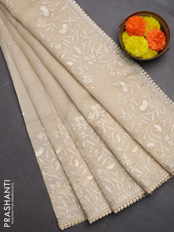 Semi Chanderi Saree beige with allover mirror embroidery buttas and corsha lace work border