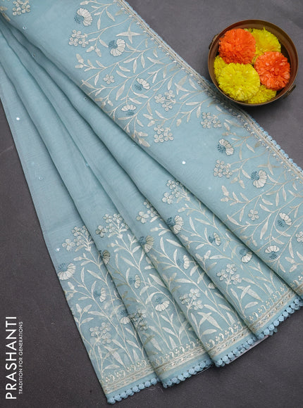 Semi Chanderi Saree pastel blue with allover mirror embroidery buttas and corsha lace work border