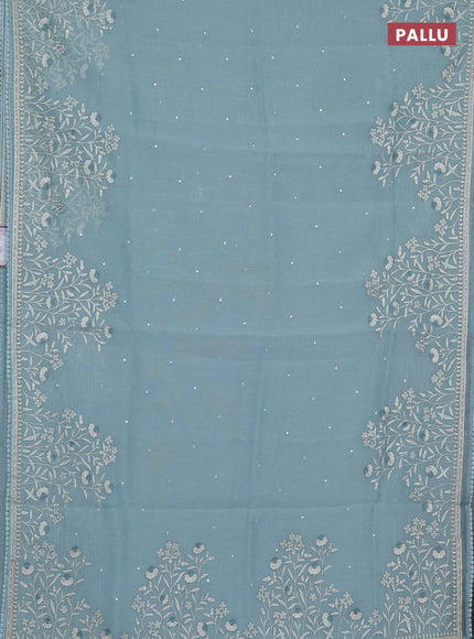 Semi Chanderi Saree pastel blue with allover mirror embroidery buttas and corsha lace work border