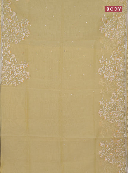 Semi Chanderi Saree pale yellow with allover mirror embroidery buttas and corsha lace work border
