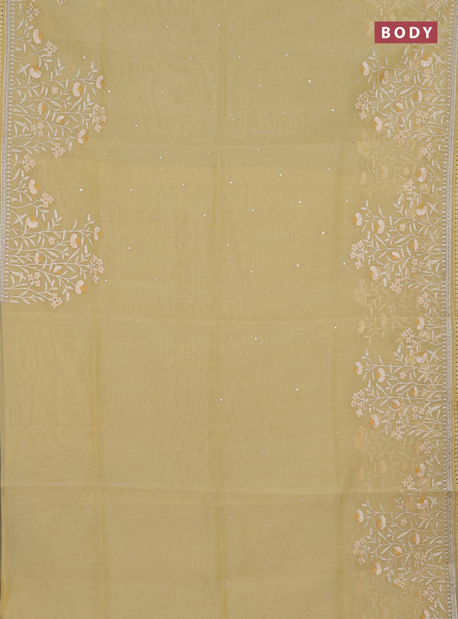 Semi Chanderi Saree pale yellow with allover mirror embroidery buttas and corsha lace work border