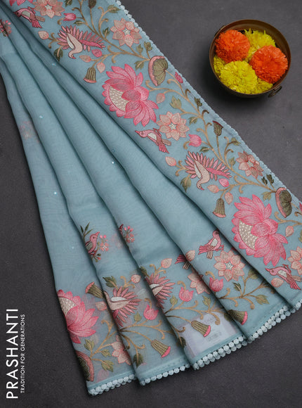 Semi Chanderi Saree teal blue with mirror work buttas and embroidery work border