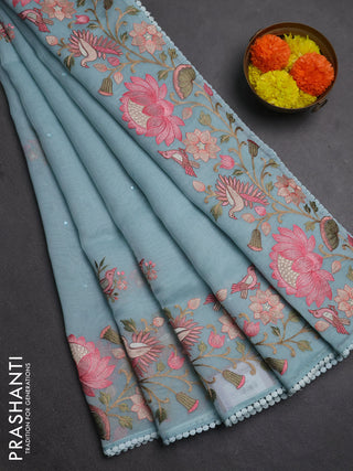 Semi Chanderi Saree teal blue with mirror work buttas and embroidery work border
