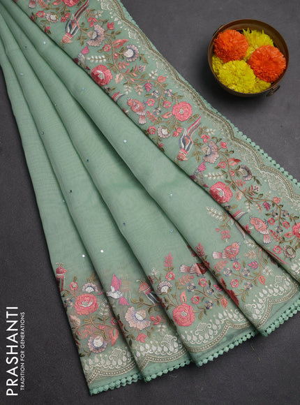 Semi Chanderi Saree pastel green with mirror work buttas and embroidery work border