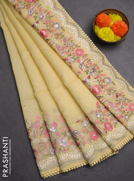 Semi Chanderi Saree yellow with mirror work buttas and embroidery work border