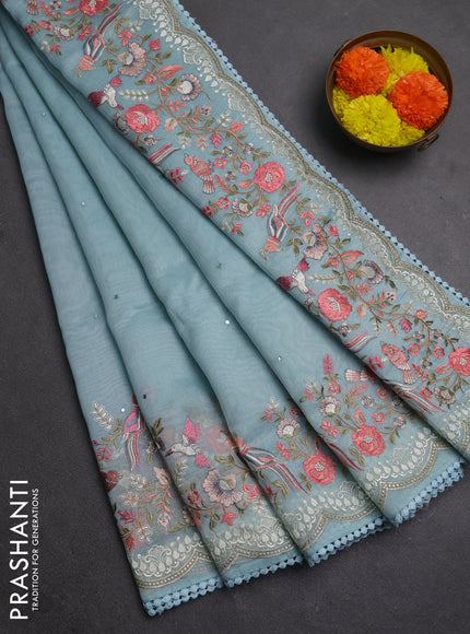 Semi Chanderi Saree teal blue with mirror work buttas and embroidery work border