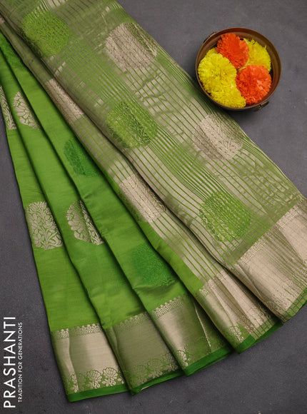 Semi raw silk saree light green with allover thread & zari woven buttas and zari woven border