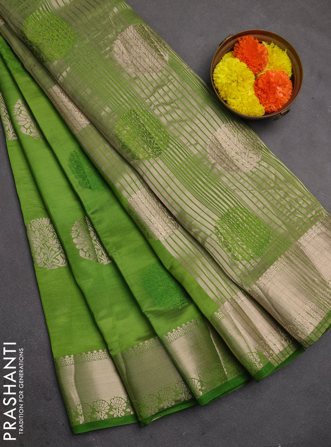Semi raw silk saree light green with allover thread & zari woven buttas and zari woven border
