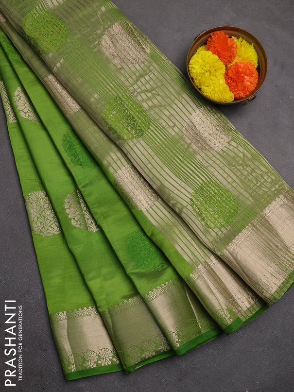 Semi raw silk saree light green with allover thread & zari woven buttas and zari woven border