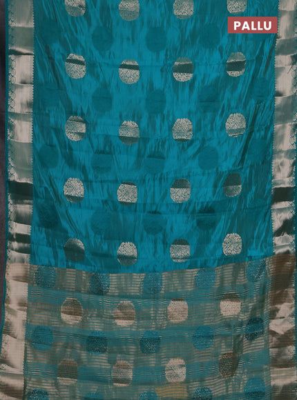 Semi raw silk saree teal green with allover thread & zari woven buttas and zari woven border