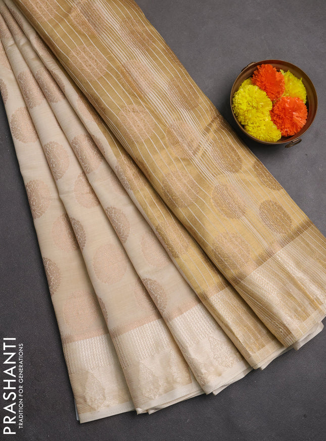 Semi raw silk saree cream with allover thread & zari woven buttas and thread woven border