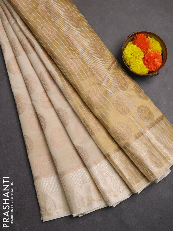 Semi raw silk saree cream with allover thread & zari woven buttas and thread woven border
