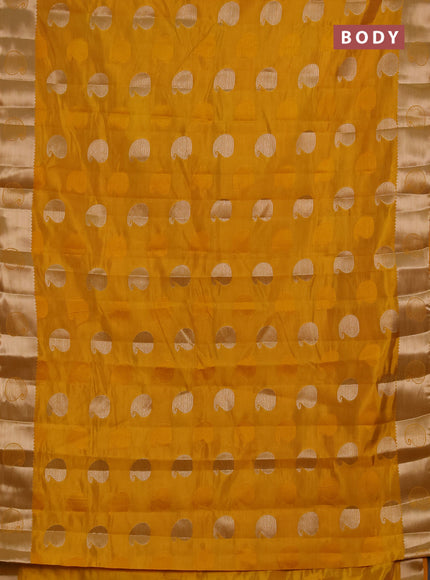 Semi raw silk saree mustard yellow with allover thread & zari woven buttas and zari woven butta border