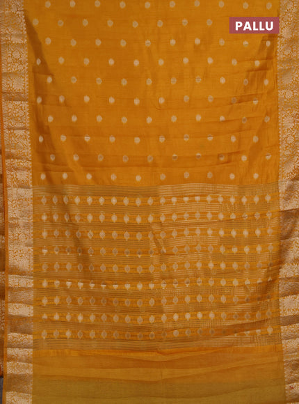Semi raw silk saree mustard yellow with allover thread & zari woven buttas and zari woven border