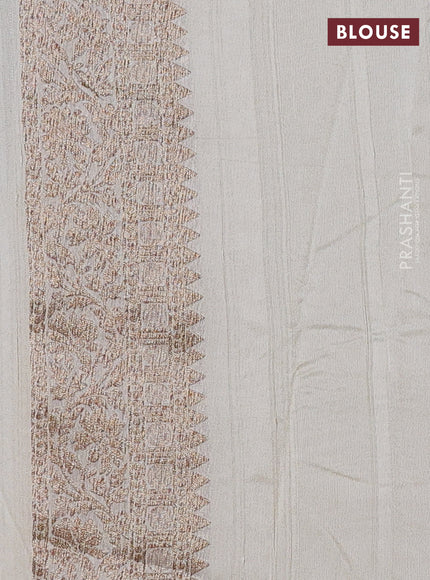 Banarasi semi raw silk saree cream with allover thread & zari woven buttas and long woven border