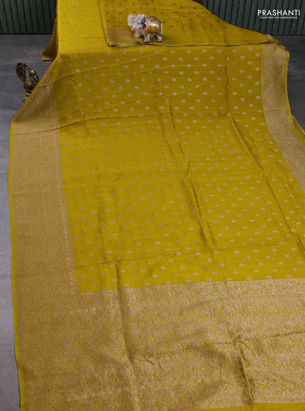 Banarasi semi raw silk saree yellow with allover thread & zari woven buttas and long woven border