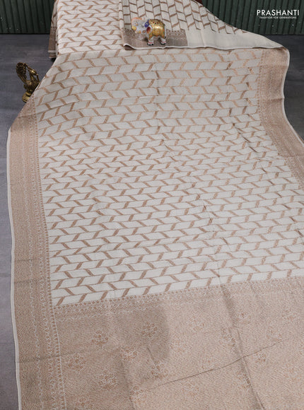 Banarasi semi raw silk saree beige with allover thread & zari woven weaves and woven border
