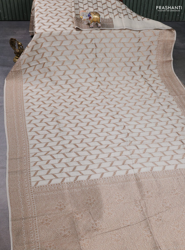 Banarasi semi raw silk saree beige with allover thread & zari woven weaves and woven border