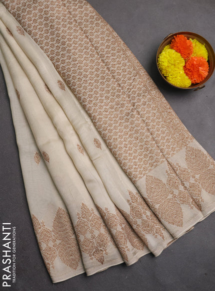 Banarasi semi raw silk saree off white with allover thread & zari woven buttas and woven border