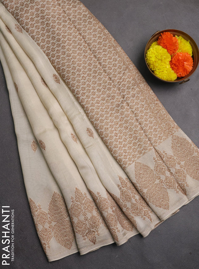 Banarasi semi raw silk saree off white with allover thread & zari woven buttas and woven border