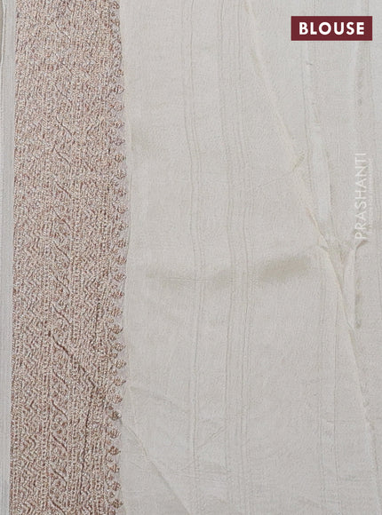 Banarasi semi raw silk saree off white with allover thread & zari woven buttas and woven border