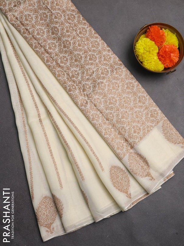 Banarasi semi raw silk saree cream with allover thread & zari woven weaves and woven butta border