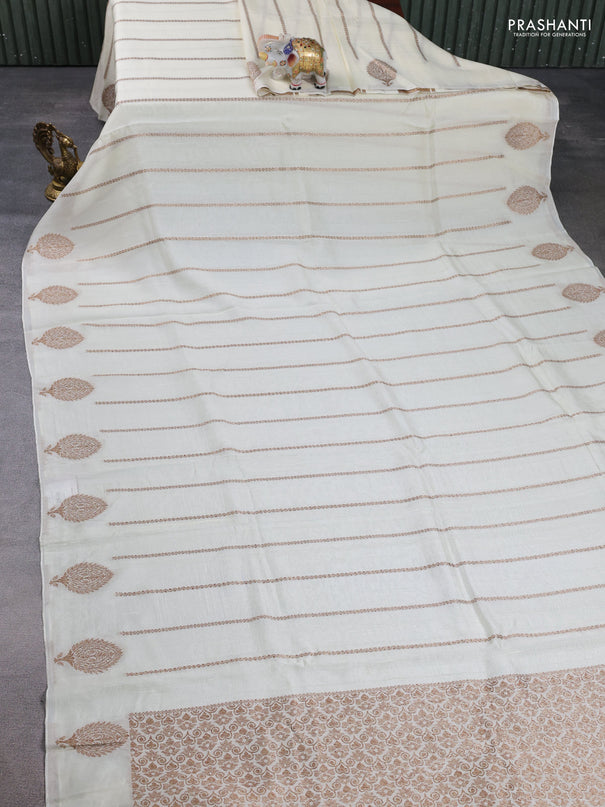 Banarasi semi raw silk saree cream with allover thread & zari woven weaves and woven butta border