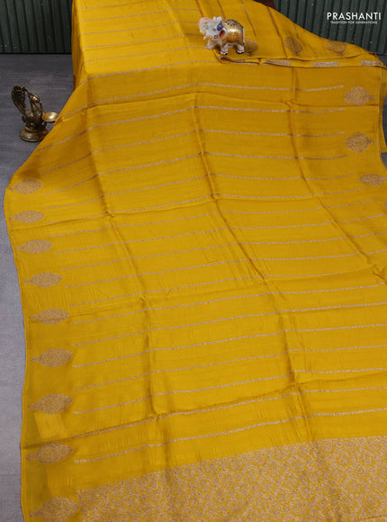 Banarasi semi raw silk saree mustard yellow with allover thread & zari woven weaves and woven butta border