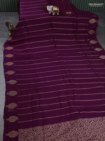 Banarasi semi raw silk saree wine shade with allover thread & zari woven weaves and woven butta border