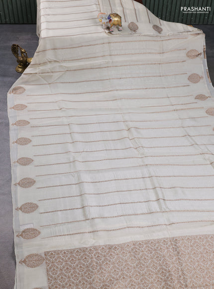 Banarasi semi raw silk saree off white with allover thread & zari woven weaves and woven butta border