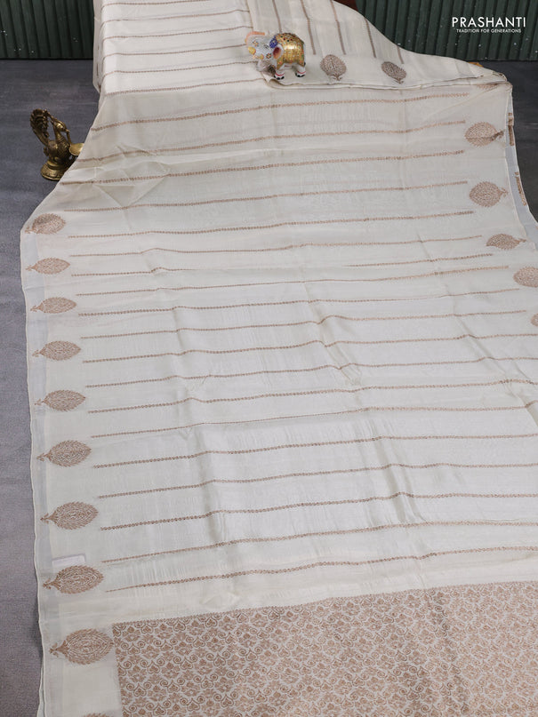Banarasi semi raw silk saree off white with allover thread & zari woven weaves and woven butta border