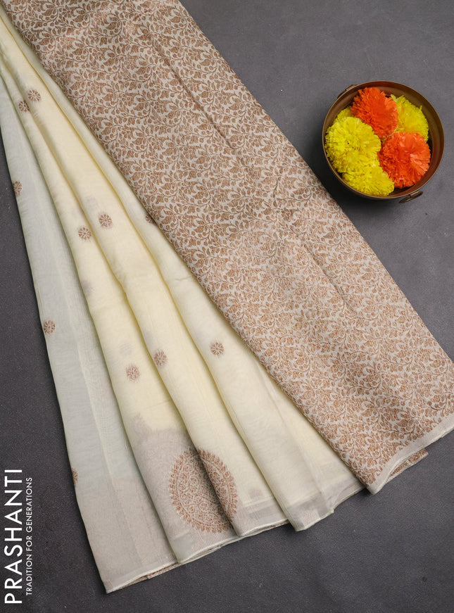 Banarasi semi raw silk saree cream with allover thread & zari woven buttas and woven butta border