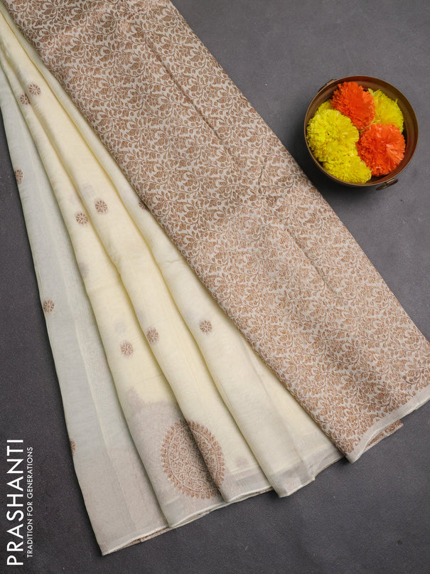 Banarasi semi raw silk saree cream with allover thread & zari woven buttas and woven butta border