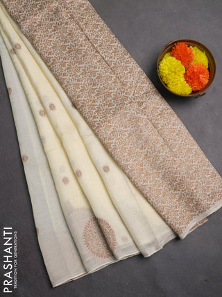 Banarasi semi raw silk saree cream with allover thread & zari woven buttas and woven butta border