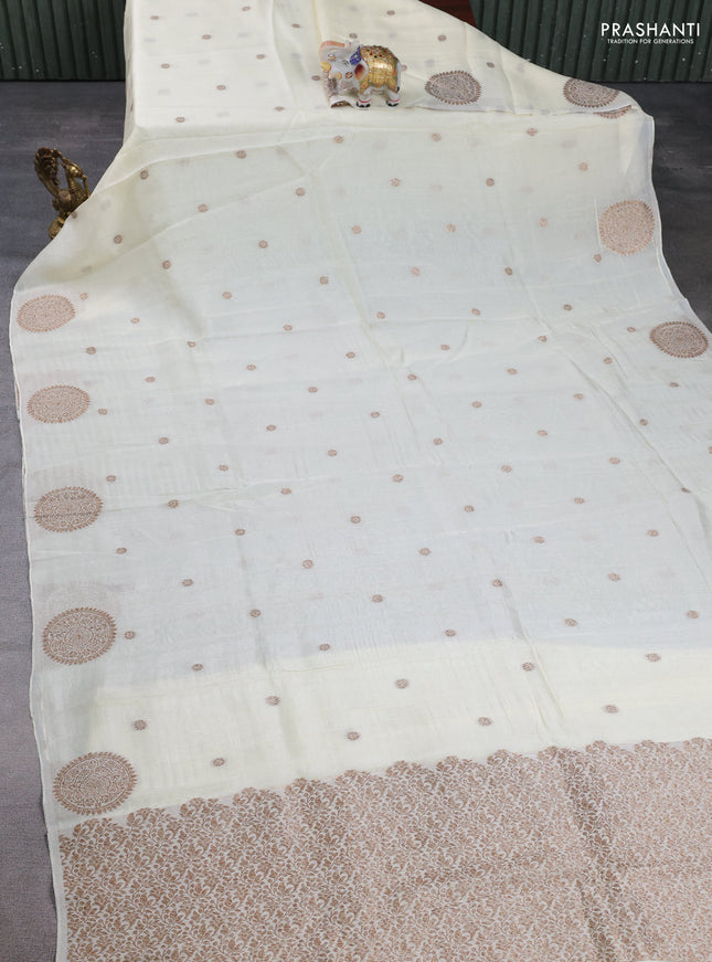 Banarasi semi raw silk saree cream with allover thread & zari woven buttas and woven butta border