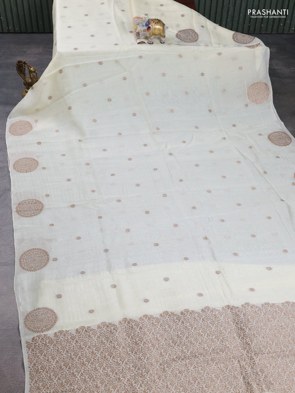 Banarasi semi raw silk saree cream with allover thread & zari woven buttas and woven butta border