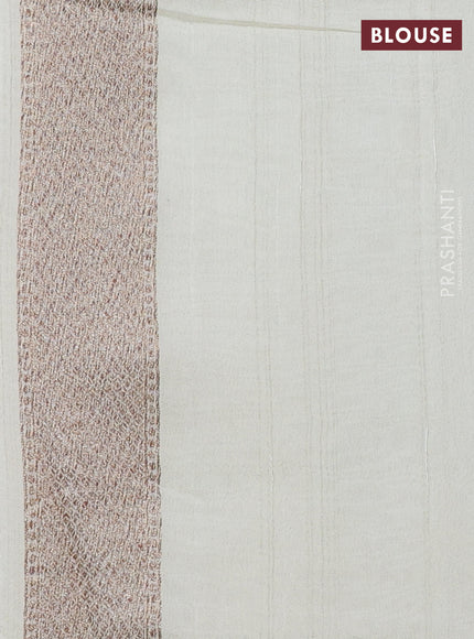 Banarasi semi raw silk saree cream with allover thread & zari woven buttas and woven butta border