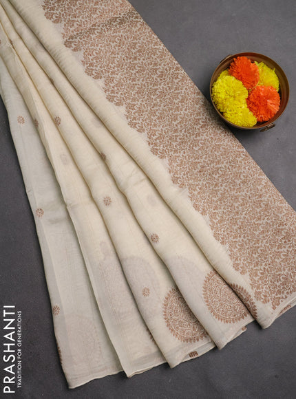 Banarasi semi raw silk saree off white with allover thread & zari woven buttas and woven butta border