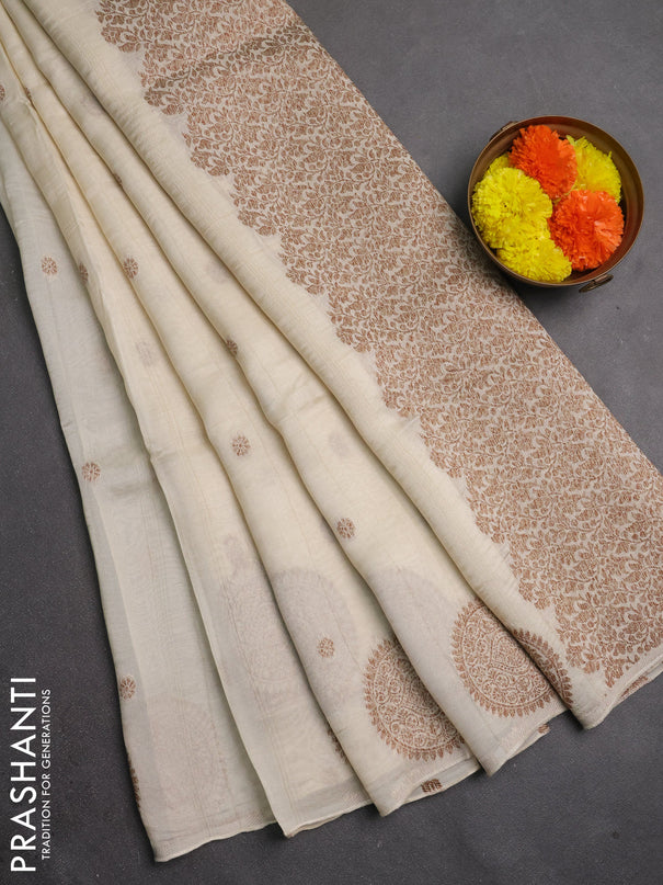 Banarasi semi raw silk saree off white with allover thread & zari woven buttas and woven butta border