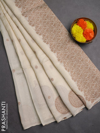 Banarasi semi raw silk saree off white with allover thread & zari woven buttas and woven butta border