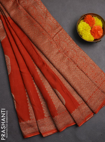 Banarasi semi raw silk saree rust shade with allover thread & zari weaves & buttas and woven border