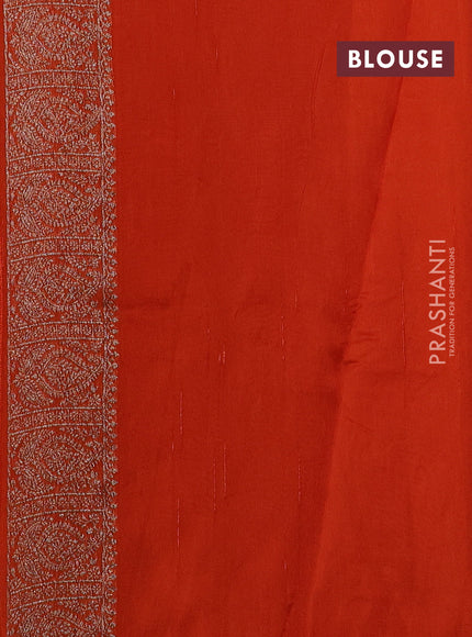 Banarasi semi raw silk saree orange with allover thread & zari weaves & buttas and woven border