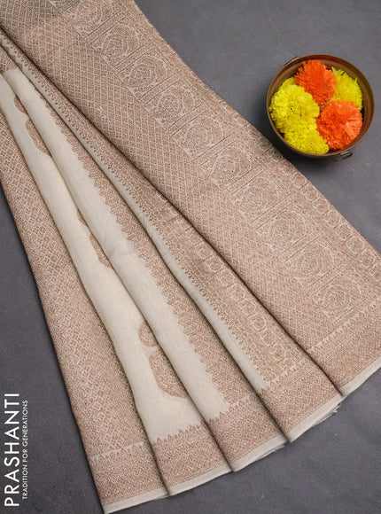 Banarasi semi raw silk saree cream with allover thread & zari weaves & buttas and woven border