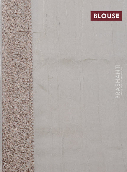 Banarasi semi raw silk saree cream with allover thread & zari weaves & buttas and woven border