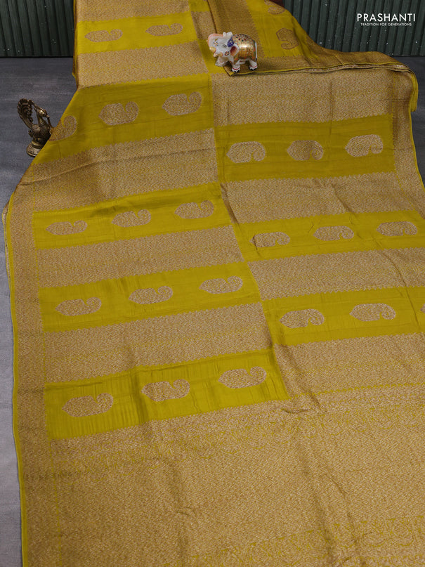 Banarasi semi raw silk saree mustard green with allover thread & zari weaves & buttas and woven border