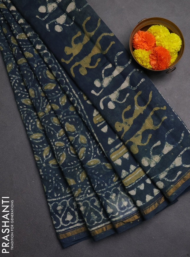 Chanderi bagru saree dark grey with allover batik prints and zari woven border