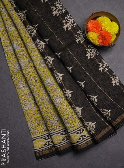 Chanderi bagru saree light green and black with allover kalamkari prints and zari woven border
