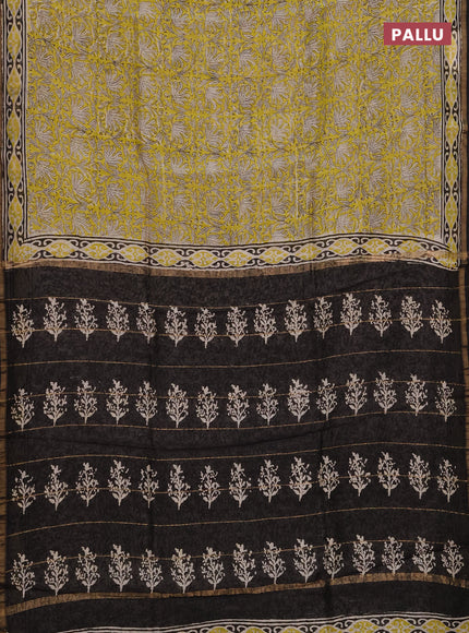 Chanderi bagru saree light green and black with allover kalamkari prints and zari woven border